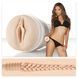 Jenna Haze у чорному білизні тримає мастурбатор Fleshlight зі своєю копією