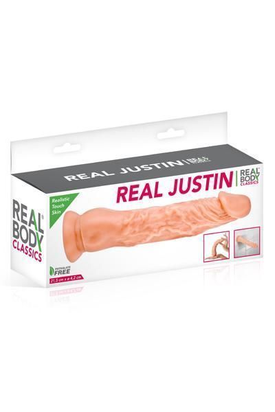 Упаковка тілесного ділдо Real Justin з позначенням довжини 21,5 см