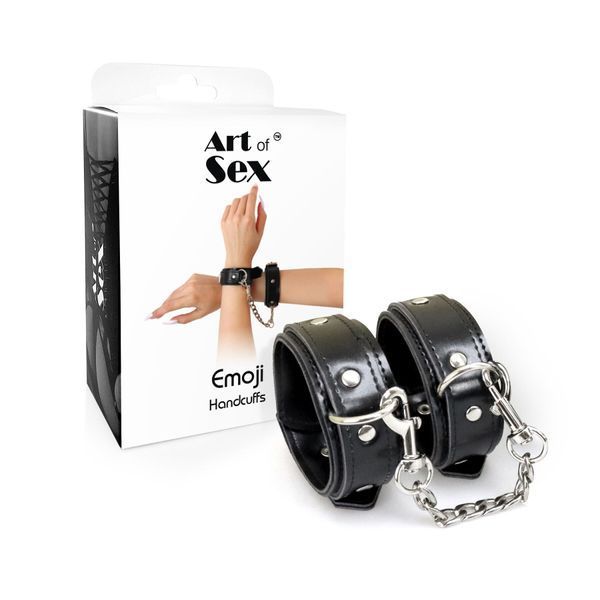 Комплект БДСМ наручників Art of Sex Handcuffs Emoji чорні поруч з оригінальною упаковкою