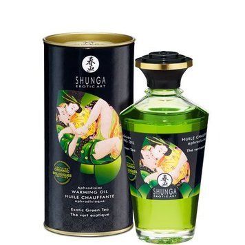 Зображення масажної олії Shunga Aphrodisiac з відтінком розкішного фіолетового кольору на фоні ніжного квіткового мотиву.