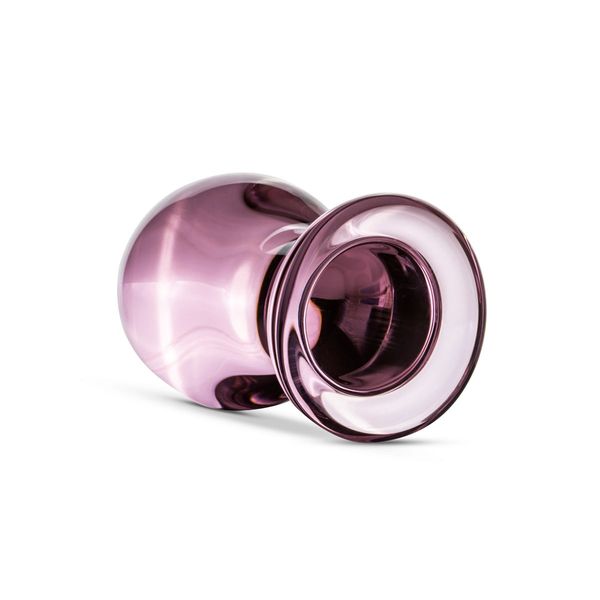 Дозвольте представити вам неймовірний анальний стимулятор – Gildo Pink Glass Buttplug! Його витончений дизайн, виконаний з якісного рожевого скла, забезпечує чарівне відчуття розкіші та класу. Цей стимулятор має гладку поверхню, що дозволяє комфортно вико